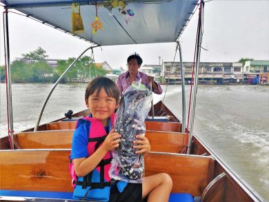 kids in the boat